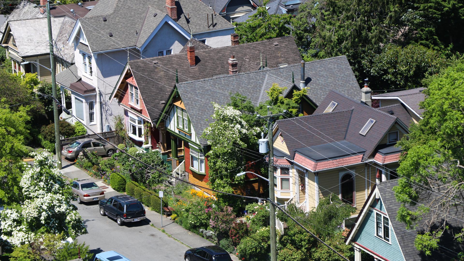 An image from above of a row of heritage houses on a street in Victoria