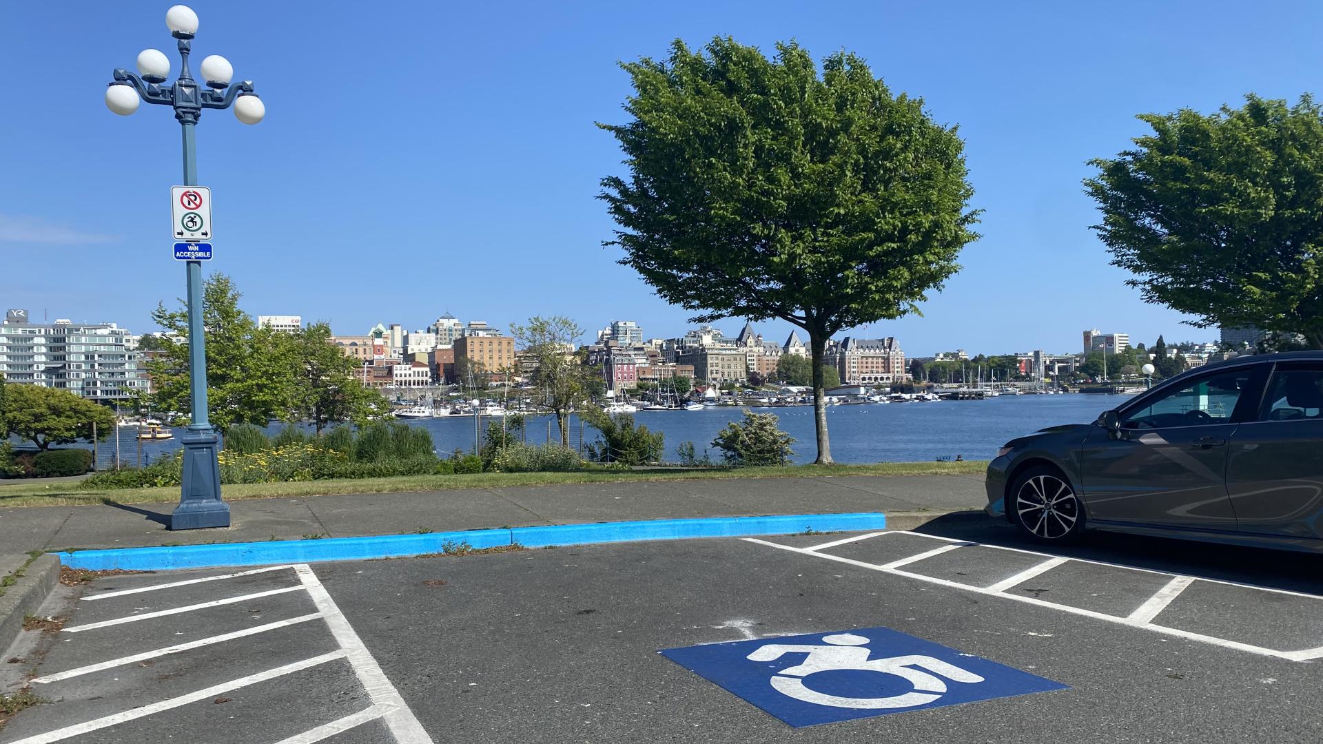 picture of accessible parking space facing inner harbour with downtown visible in the background