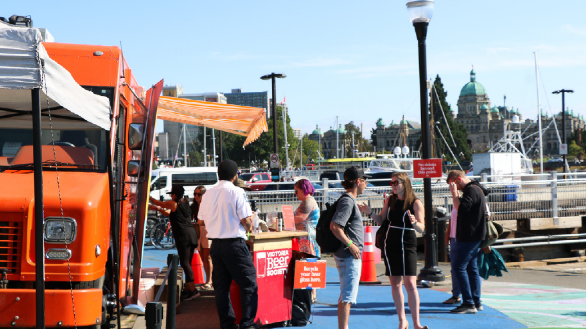 Image of the Victoria Beer Society's Food Truck with people standing close by at Ship Point
